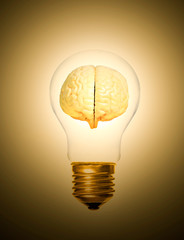 concept of brain within a light bulb lit up moment as a light bulb