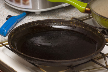 cooking pancakes in a frying pan