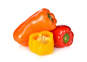 fresh Aura sweet red, yellow and orange pepper on white backgrou