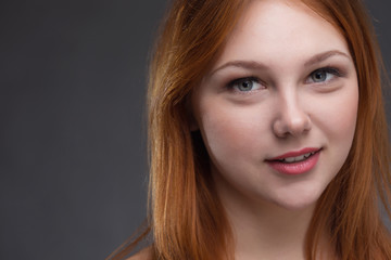 Obraz premium beautiful young red-haired woman