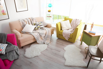 Fototapeta na wymiar Modern living room design with sofa and armchairs