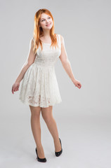 Naklejka premium young woman in a white dress