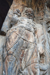 Porter rock statue in Longmen Grottoes, Luoyang, China