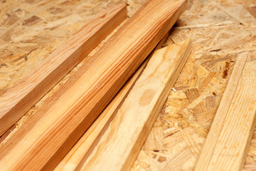 carpenter working,hammer,meter and screw-driver on construction background