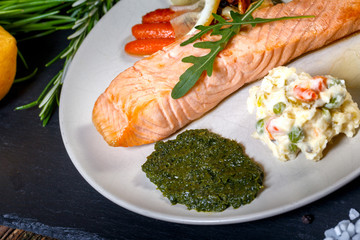 grilled Salmon with lemon, herbs and pesto