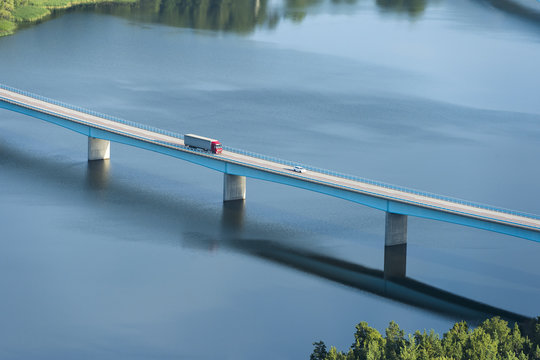 Fototapeta Aerial view of semi-truck on bridge
