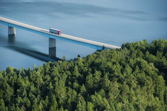 Aerial view of semi-truck on bridge