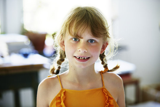 Portrait of girl with pigtails