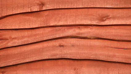 Wooden wall assembled of boards