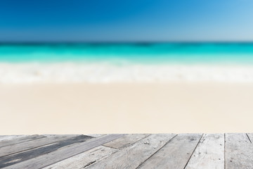 Fototapeta premium Wood floor on blue sea background