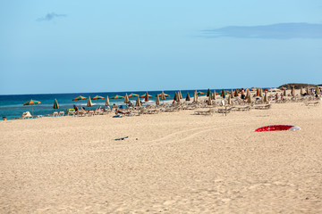 Tourists rest on Corralejo Beach on Fuerteventura, Canary Islands