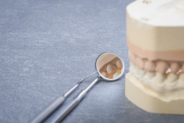 Fototapeta na wymiar Teeth mold with dental tools