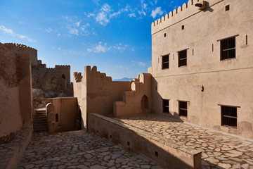 A historical fort with views of the inside of the fort walls and