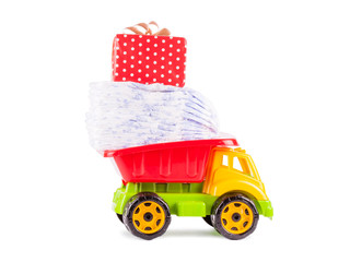 toy truck with a pile of diapers