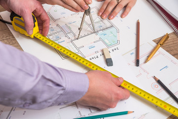 businessmen meeting architect for house project with work tools