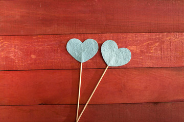 two hearts on a stick