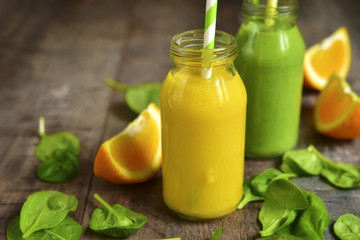 Two variations of fruit and vegetable smoothies.