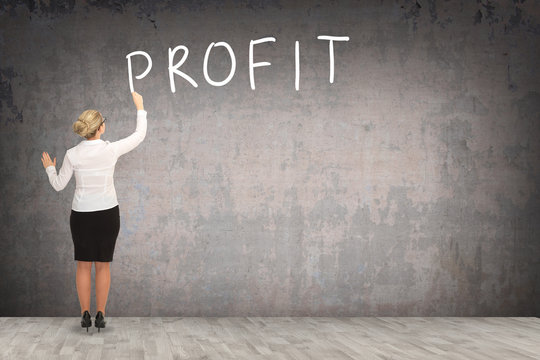 Business woman drawing on the wall. business concept
