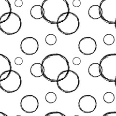 grunge black circles on white background seamless vector pattern illustration
