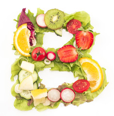 Letter B made of salad and fruits