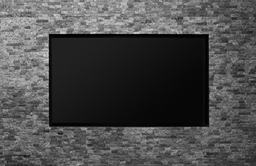Blank tv on the brick wall with copy space