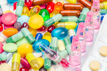 ampoule and pills shot