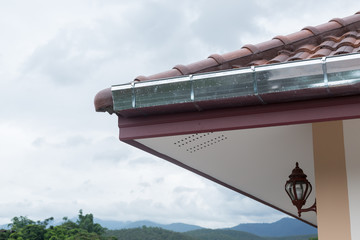 gutter roof on house in rainy day