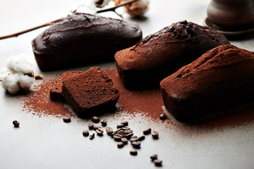 Tasty chocolate cake and cotton flowers