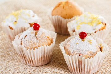 Muffins with cranberries and lemon zest, closeup