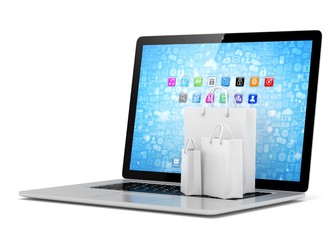 laptop and  shopping pags on white background. 3d rendering.
