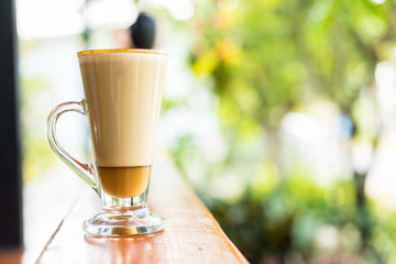 latte coffee cup on wooden table ,soft focus