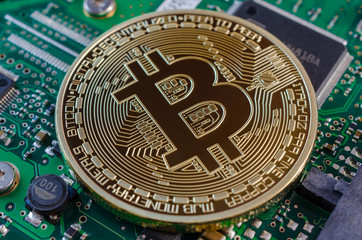 Concept of Bitcoin like a computer chip on motherboard