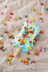 Macro of blue popsicle melting