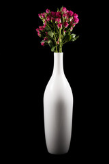 Small roses and white vase