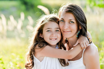 mother and daughter hugging