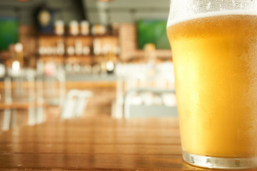 a glass of beer on table