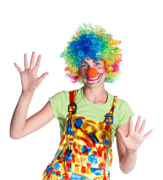 Girl dressed as a clown isolated