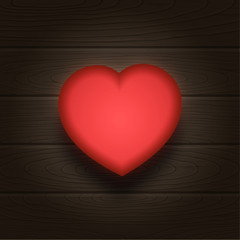 Obraz na płótnie Canvas Glowing heart on wooden background. Valentines Day or Wedding card design.