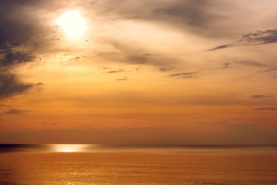 Beautiful sunset above the sea. Gold sea sunset landscape © samael334