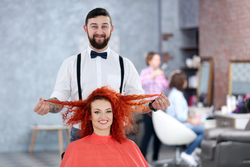 Beautiful girl visit hairdressing salon