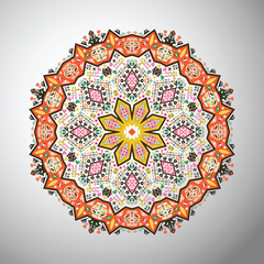 Ornamental round colorful geometric pattern in aztec style