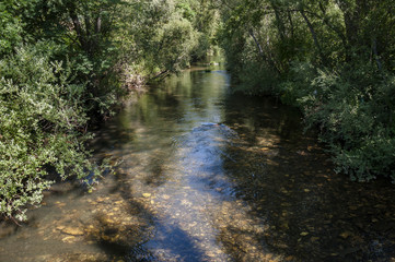 Obraz premium Views of the River Bernesga on its way through La Pola de Gordon Municipality, in Leon Province, Spain