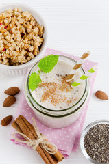 Milkshake on pink napkin, top view, close-up
