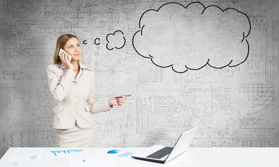 Pensive woman at work