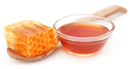 Honey comb with honey in a glass bowl