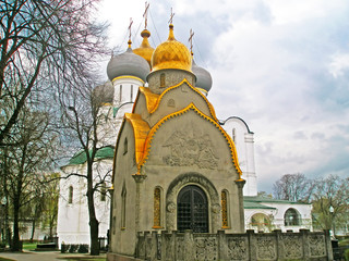 The Prokhorovs' chapel-shrine  and Cathedral Church of the Smolensk Icon of the Mother on the background at Novodevichy Convent, Moscow, Russia