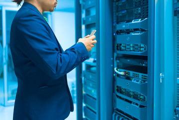 Man fix server network in data center room