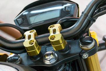 Close up at the locking handle of the motorcycle.