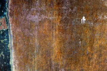 old iron surface from the remains of blue paint