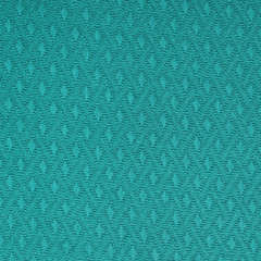 Turquoise multilayer fiber fabric texture. Close up, top view.